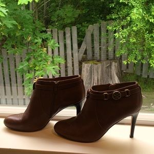 COACH brown heeled booties.